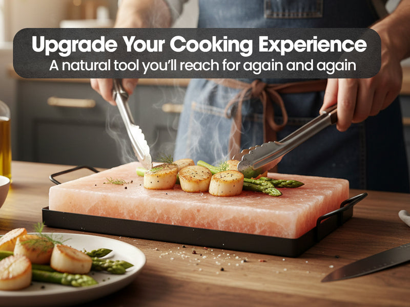 Zestiq Foods Himalayan Pink Salt Cooking Block with metal tray used to sear scallops and asparagus in a home kitchen