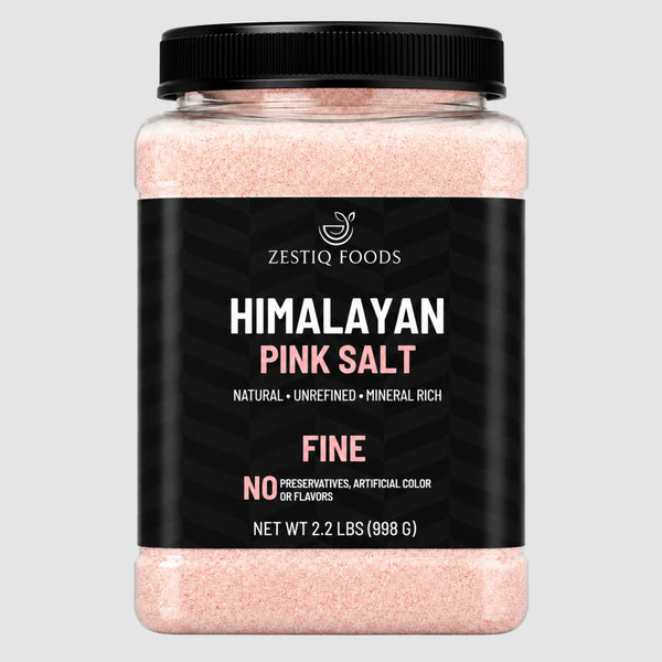 Zestiq Foods Himalayan Pink Salt Fine Grain 2.2 lb jar with black lid and fine pink salt on white background